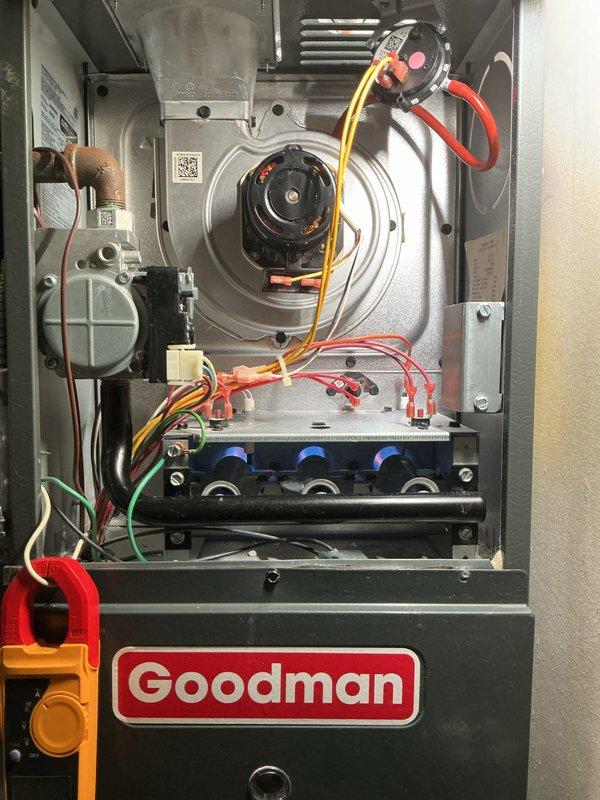 Responded to no heat call on Goodman furnace system. Upon arrival, performed diagnostic inspection of unit with access panels removed to assess all internal components including blower motor assembly, control board, pressure switches, and burner assembly. Utilized diagnostic meter to test electrical connections and verify proper voltage to motor and control circuits, identifying cause of heating failure and completing necessary repairs to restore system operation.