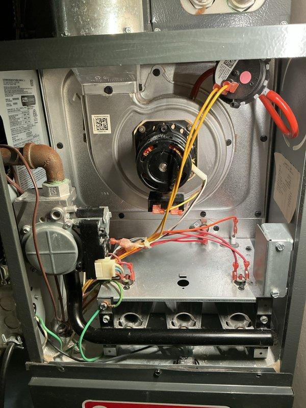Responded to no heat call on Goodman furnace system. Upon arrival, performed diagnostic inspection of unit with access panels removed to assess all internal components including blower motor assembly, control board, pressure switches, and burner assembly. Utilized diagnostic meter to test electrical connections and verify proper voltage to motor and control circuits, identifying cause of heating failure and completing necessary repairs to restore system operation.