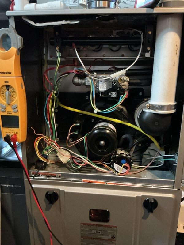 Completed comprehensive maintenance tune-up on 1-year-old Bryant HVAC system including both gas furnace and air conditioning condenser unit. Performed full system inspection with multimeter diagnostics on furnace components, verified proper operation of blower motor, heat exchanger, and electrical connections. Inspected outdoor condenser unit, confirmed proper fan operation, and verified refrigerant levels. Both heating and cooling systems tested and found operating within manufacturer specifications with no deficiencies noted.