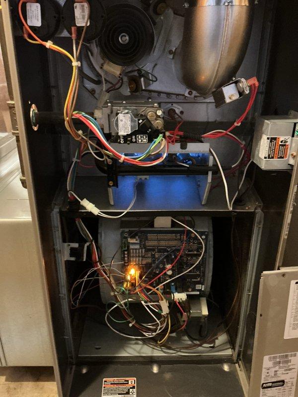 Performed comprehensive preventive maintenance on a 9-year-old residential furnace system. Conducted complete visual inspection of all internal components including blower motor assembly, draft inducer motor, gas valve, ignition system, and main control board. Verified proper operation of all electrical connections and tested capacitors for correct voltage and microfarad ratings. Inspected heat exchanger for signs of cracks or deterioration. Tested ignitor and flame sensor operation, confirming proper ignition sequence and flame detection. Verified gas valve operation and checked all wire connections for signs of heat damage or loose terminals. Examined control board for proper LED status indicators and confirmed all safety circuits functioning correctly. Checked blower motor operation and amperage draw within manufacturer specifications. System operating normally with no deficiencies noted at time of service.