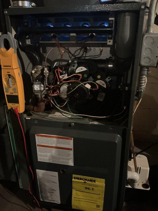 Completed comprehensive gas furnace tune-up and safety inspection on high-efficiency residential heating unit prior to heating season activation. Technician performed thorough system evaluation with particular attention to heat exchanger integrity due to previous cracked heat exchanger findings, conducted combustion analysis, inspected burner assembly and flame rollout sensors, tested all safety controls and electrical components using diagnostic equipment, and verified proper operation of blower motor and ductwork connections. All components found operating within manufacturer specifications with no current safety concerns identified, and unit cleared for seasonal use.