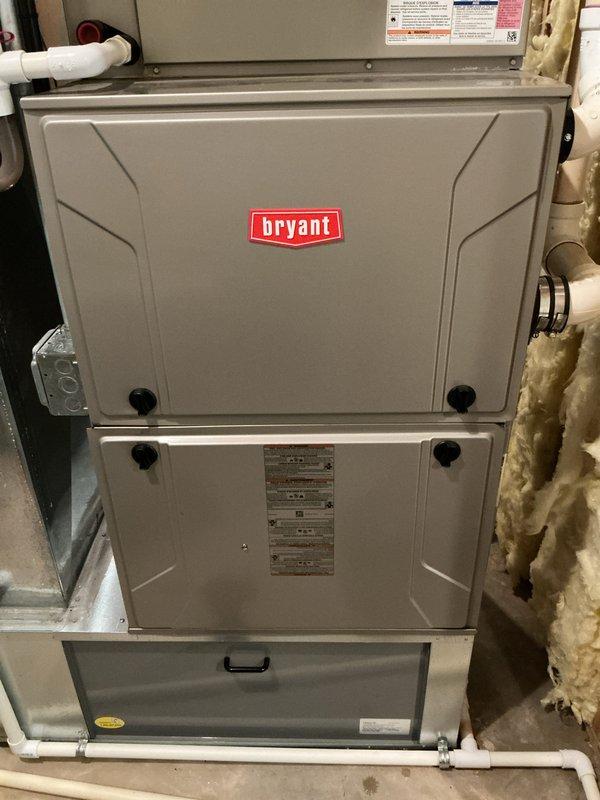 Completed seasonal maintenance on Bryant gas furnace and air conditioning system. Performed comprehensive inspection of furnace interior components including blower motor assembly, control board, electrical connections, and heat exchanger. Verified all wiring connections were secure and properly routed. Inspected and confirmed proper air filter installation and sizing per manufacturer specifications to address customer concerns regarding filter fit. Checked PVC condensate drain lines for proper operation. All internal components found in good operating condition with no visible wear, damage, or debris accumulation. System tested and operating within normal parameters.