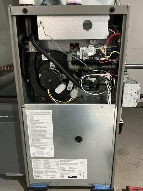Completed routine maintenance tune-up on a 2-year-old Lennox gas furnace system. Performed comprehensive inspection of all internal components including blower motor assembly, gas valve, ignition system, and electrical connections. Verified proper operation of all safety controls, checked wire connections and terminations, inspected heat exchanger for cracks or deterioration, and confirmed adequate combustion air supply. System tested and confirmed operating within manufacturer specifications with no issues found.