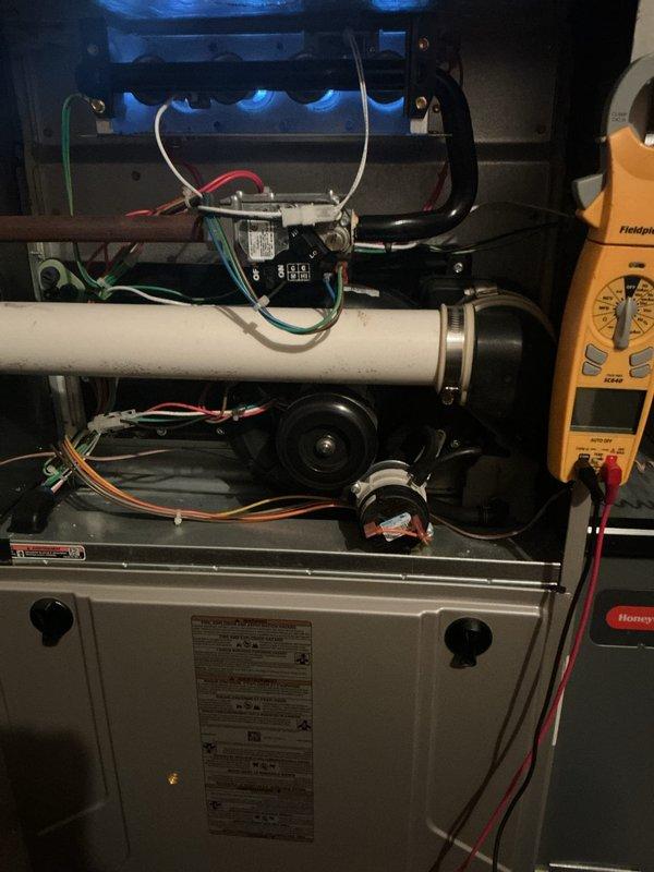 Completed scheduled AC tune-up and preventive maintenance on split system. Performed comprehensive inspection of indoor furnace components including heat exchanger, blower motor assembly, and electrical connections; verified proper operation and conducted voltage testing with multimeter. Inspected outdoor condenser unit, confirmed adequate airflow through coil, and verified fan operation and overall system performance.