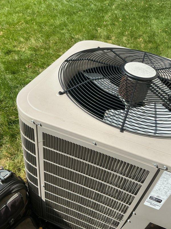 Completed scheduled AC tune-up and preventive maintenance on split system. Performed comprehensive inspection of indoor furnace components including heat exchanger, blower motor assembly, and electrical connections; verified proper operation and conducted voltage testing with multimeter. Inspected outdoor condenser unit, confirmed adequate airflow through coil, and verified fan operation and overall system performance.