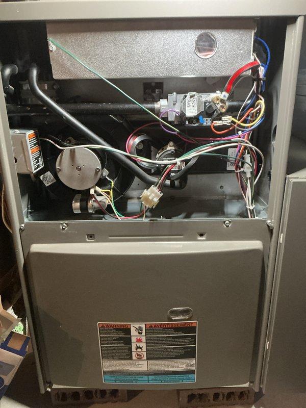 Performed comprehensive tune-up maintenance on 2-year-old Lennox furnace system. Accessed internal components, inspected blower motor assembly, electrical connections, gas valve, and control boards for proper operation. Addressed thermostat calibration concern reported as 5-degree temperature differential; verified thermostat accuracy and adjusted settings to ensure proper system cycling and temperature control.