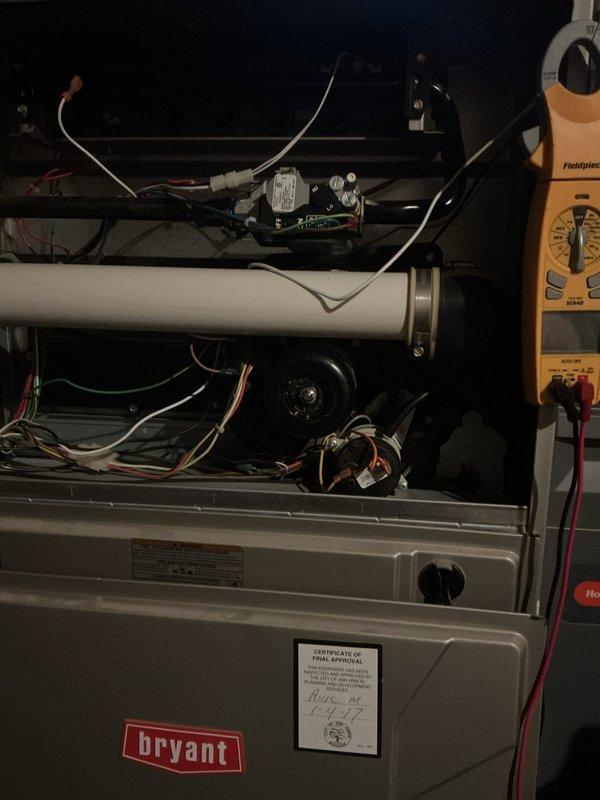 Completed comprehensive tune-up and preventive maintenance on multi-zone Bryant HVAC system, servicing both the indoor gas furnace air handler and outdoor air conditioning condensing units. Performed full system inspection, tested all electrical components and connections, verified proper refrigerant levels and pressures using diagnostic instruments, inspected blower motor and fan assemblies, checked all wiring harnesses for secure connections, and confirmed operational efficiency of both heating and cooling systems.