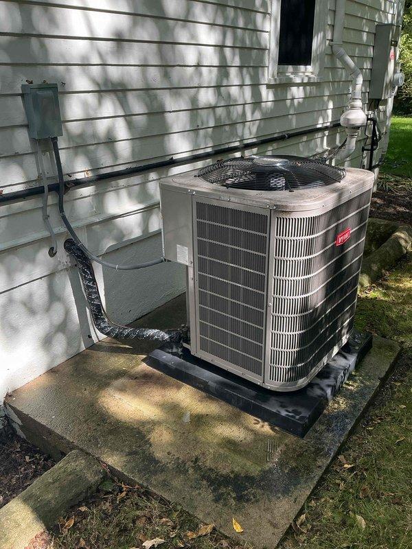 Completed annual maintenance tune-up on 3-year-old Bryant air conditioning system. Performed comprehensive inspection of outdoor condensing unit, verified proper operation of compressor and condenser fan motor, checked refrigerant levels and pressures, cleaned condenser coils, inspected electrical connections at disconnect box, and verified proper drainage through condensate line. System operating within manufacturer specifications with no deficiencies noted.