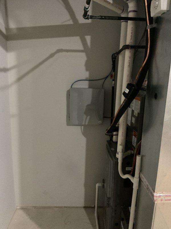 Completed installation of Arzel 2-zone zoning system in residential basement utility room. Mounted zone control panel on wall, installed motorized dampers in ductwork, ran necessary wiring and control cables to existing HVAC equipment, and integrated system with furnace for independent temperature control of two separate zones. All components properly secured, labeled, and tested for proper operation.