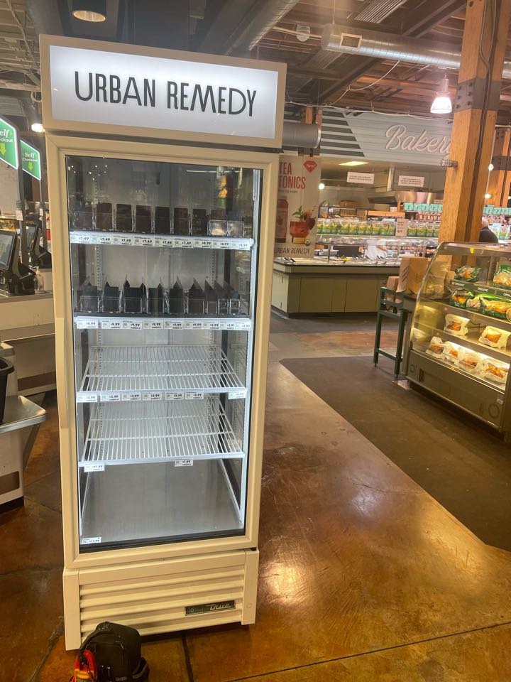 Commercial refrigeration repair.  Door adjustment. 