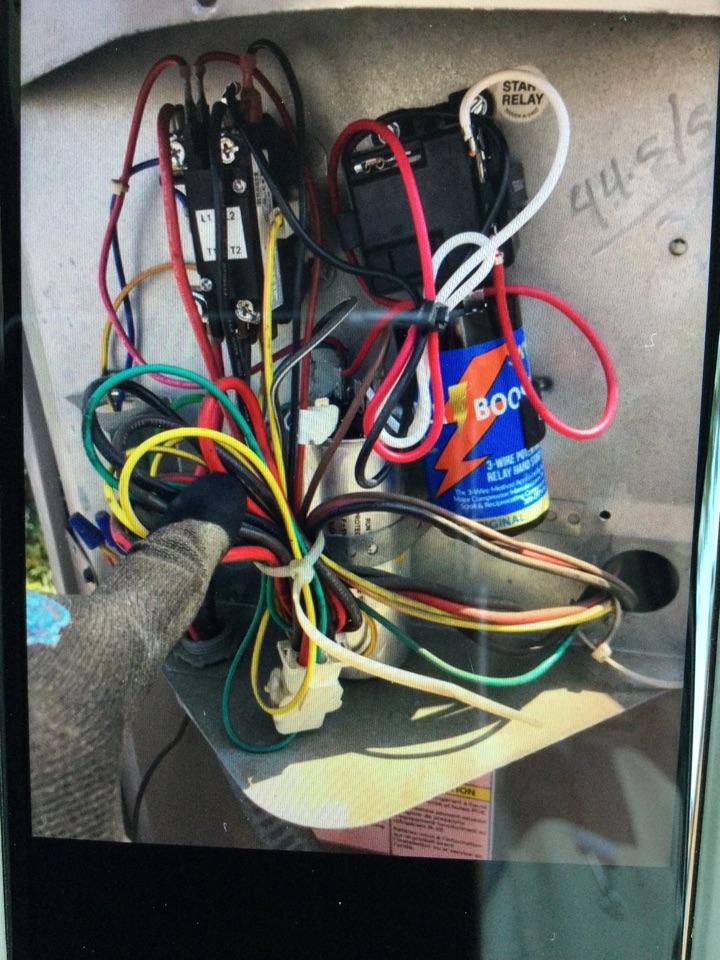Best air conditioning technician near me working on repairing air conditioner that is non-operational and it’s going to cool