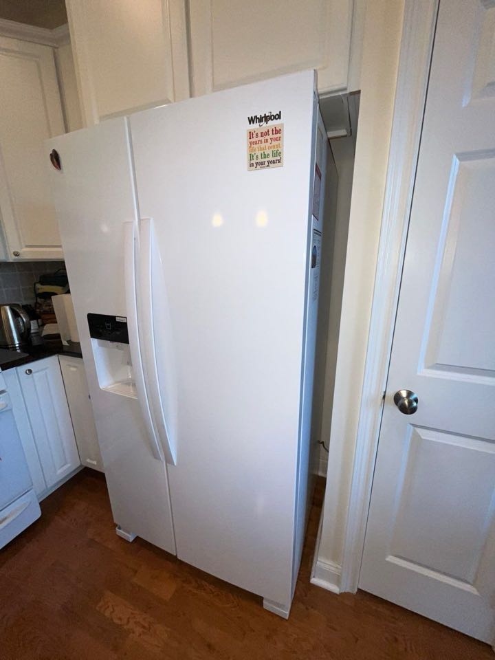 Installation of new ice maker water hose for new fridge 