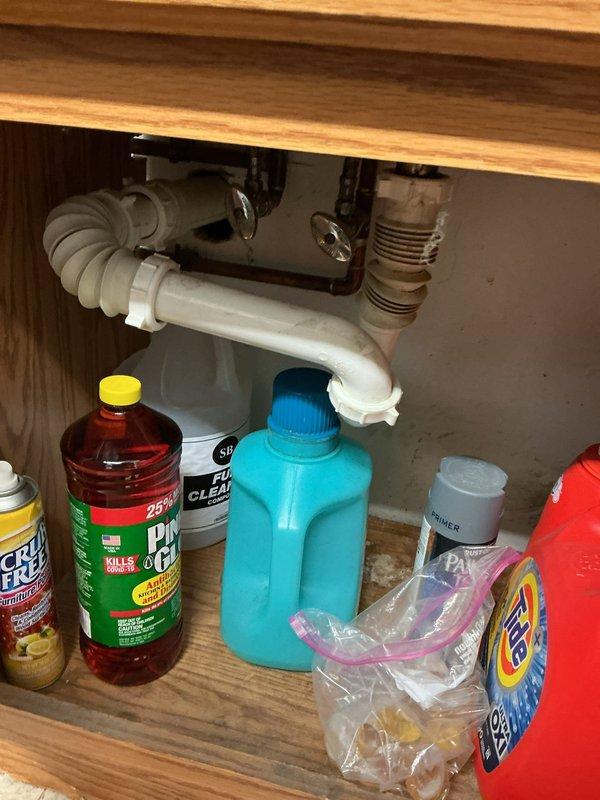 Responded to service call for two backed up sinks in basement and bathroom. Inspected plumbing including P-trap and drain line components under both fixtures. Cleared blockages and verified proper drainage function through both systems. Both sinks now draining normally with no further issues observed.