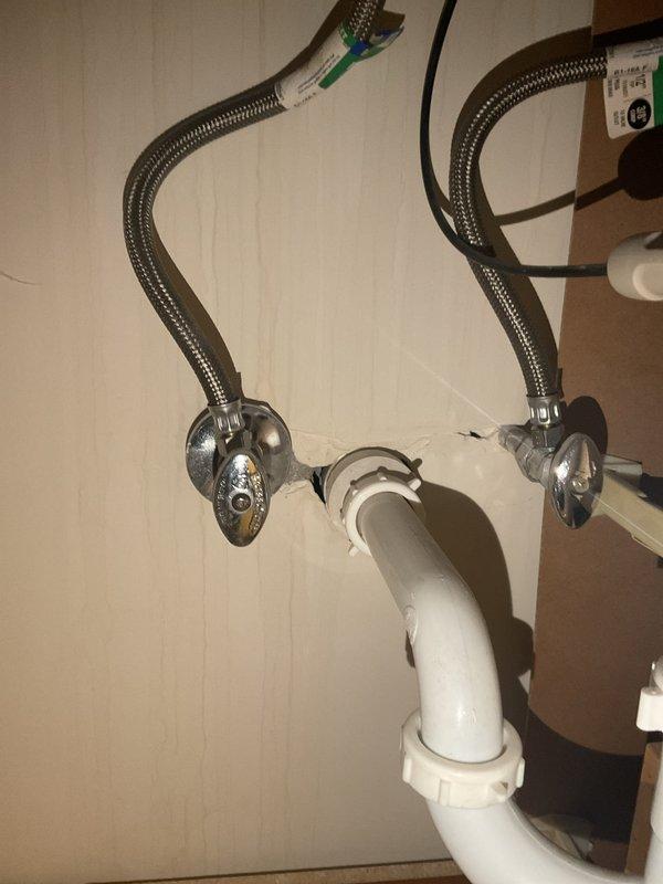 Conducted service call transferred from Jacob. Inspected under-sink plumbing installation including braided supply lines, shut-off valves, and PVC drainage system with P-trap. Verified all components properly installed and functioning with no visible leaks.