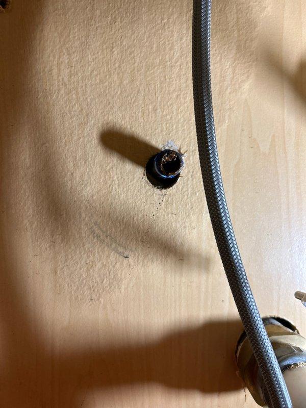 Responded to priority service call regarding lack of hot water in both bathrooms with slow overall flow. Upon inspection, found partially clogged cartridge in sink valve assembly and mineral buildup in supply lines. Cleaned cartridge, flushed supply lines, and verified proper connection of braided supply hoses. Performed preventative maintenance on water heater per customer request. All bathroom fixtures now receiving adequate hot water flow.