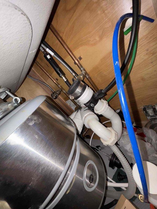Conducted water treatment assessment following customer's report of lead contamination in their water supply. Inspected existing plumbing infrastructure including under-sink connections and the Rheem Performance Plus water heater to determine optimal installation options for either reverse osmosis system or whole house filtration solution. Customer requires implementation during specific time windows (12PM-3PM or after 3:30PM).