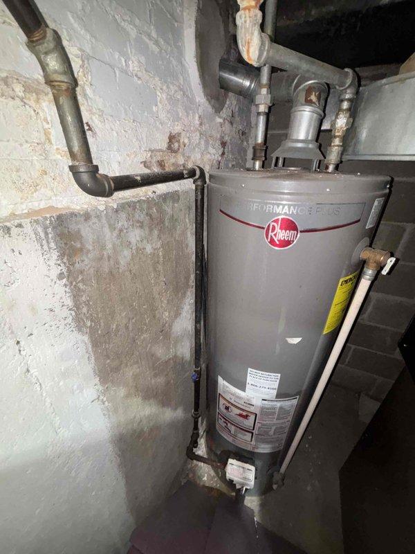 Conducted water treatment assessment following customer's report of lead contamination in their water supply. Inspected existing plumbing infrastructure including under-sink connections and the Rheem Performance Plus water heater to determine optimal installation options for either reverse osmosis system or whole house filtration solution. Customer requires implementation during specific time windows (12PM-3PM or after 3:30PM).