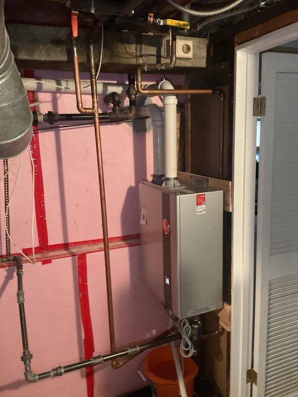 Performed a professional assessment of customer's water heater installation previously completed by another company. Upon inspection, noted the installation was improperly executed. Took comprehensive documentation of the current setup but determined that the photos provided do not actually show the water heater in question, as they depict bicycles and a furnace installation instead. Customer will need to reschedule for proper remediation work.