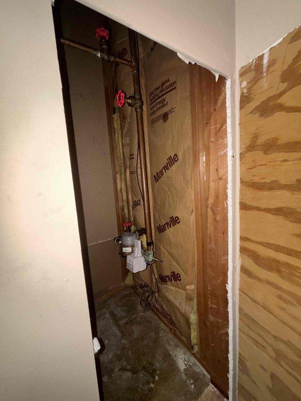 Conducted an estimate for replacement of existing GE 50-gallon gas water heater (40,000 BTU) located in utility closet with significant water staining evident on surrounding framing. Inspection revealed copper supply lines with shut-off valves, proper venting system, and possible minor leakage near base of current unit. Customer advised of replacement options and availability beginning 8AM.