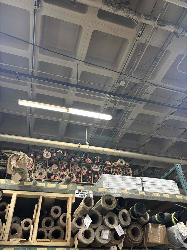 Conducted site assessment for potential tankless water heater conversion in commercial/industrial facility. Evaluated existing structure, ceiling infrastructure, and utility access points to determine feasibility. Customer requires hot water solution for industrial application; recommended tankless system as appropriate option based on space constraints and application requirements.
