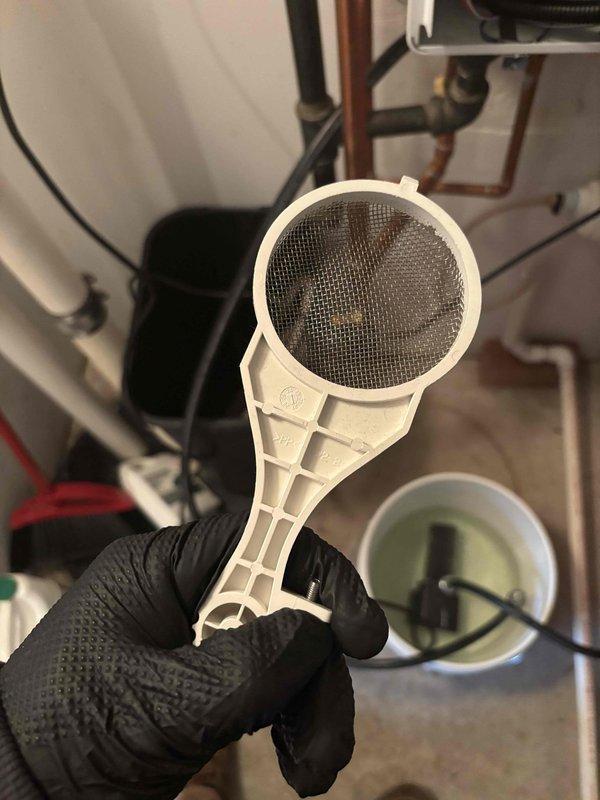 Conducted scheduled VIP maintenance on customer Sarah's tankless water heater system. Removed and inspected the inlet water filtration screen, which showed significant sediment buildup. Cleaned debris from the filter to prevent flow restrictions and potential damage to the tankless unit. Recommended regular filter maintenance to ensure optimal system performance and longevity.