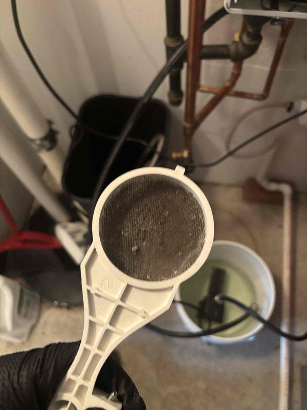 Conducted scheduled VIP maintenance on customer Sarah's tankless water heater system. Removed and inspected the inlet water filtration screen, which showed significant sediment buildup. Cleaned debris from the filter to prevent flow restrictions and potential damage to the tankless unit. Recommended regular filter maintenance to ensure optimal system performance and longevity.