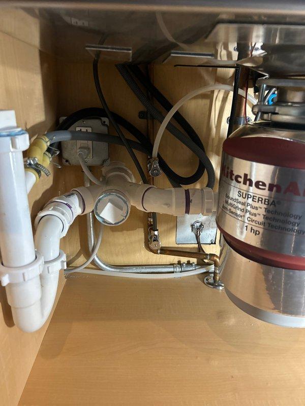 Successfully installed new touch-sensitive kitchen faucet with pull-down spray head functionality. Connected all supply lines and verified proper operation of the touch sensor and LED indicator. Ensured compatibility with existing plumbing system including KitchenAid garbage disposal without any leaks or issues.