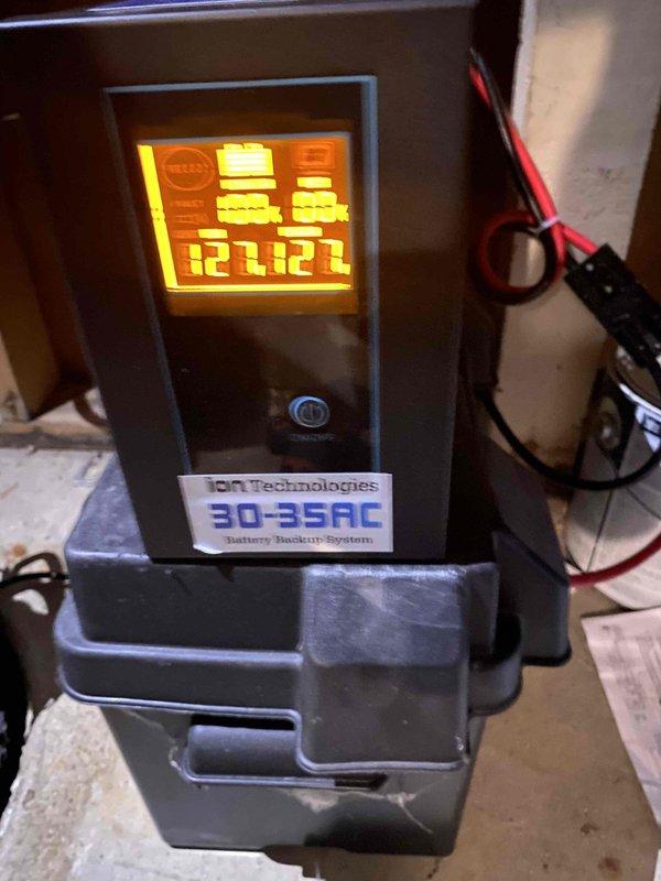 Diagnosed and verified functionality of ION Technologies 30-35AC battery backup system. Used Fluke 117 True RMS multimeter to confirm proper voltage output of 123.8V, within acceptable operating range. System was functioning normally and returned to service.