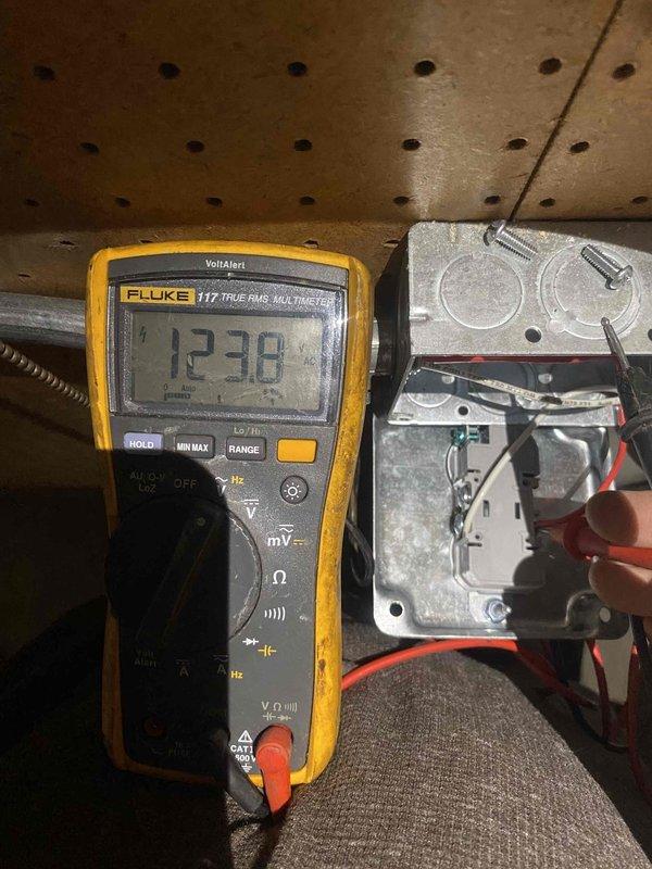 Diagnosed and verified functionality of ION Technologies 30-35AC battery backup system. Used Fluke 117 True RMS multimeter to confirm proper voltage output of 123.8V, within acceptable operating range. System was functioning normally and returned to service.