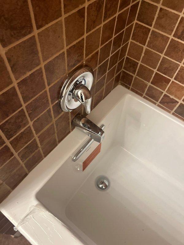 Responded to priority service call for toilet reset and tub trim installation. Successfully installed existing tub trim with new chrome fixtures, including central diverter valve and tub spout. Replaced toilet components including 2" flush valve, tank to bowl kit, and wall outlet gasket to complete toilet reset and ensure proper functioning.