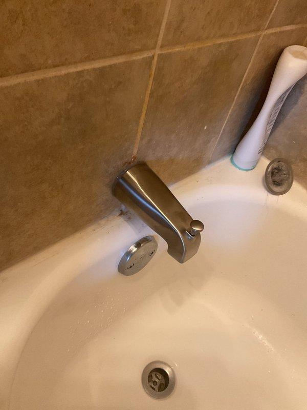 Inspected 30-gallon Rheem water heater in utility closet for replacement estimate. Unit appears functional but at end of service life based on age. Also noted loose kitchen faucet requiring adjustment. Recommendations provided for appropriate replacement options considering existing space constraints and current plumbing configuration.