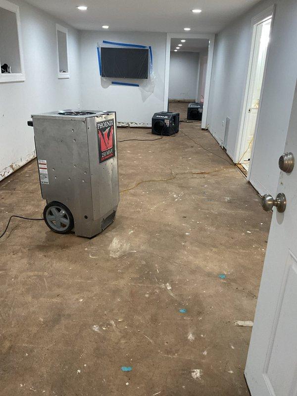 Responded to service call for failed sump pump in basement. Inspected system and determined pump required replacement. Installed new sump pump and verified proper operation. Placed industrial dehumidifier to address residual moisture in the affected area.