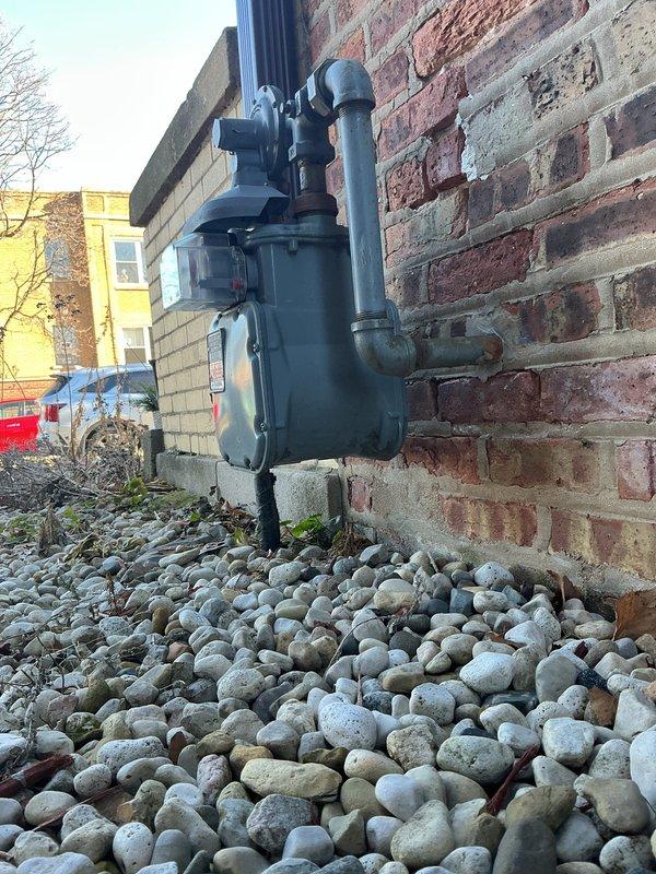 Responded to customer warranty inquiry regarding previously installed drain tiles (approximately 3 years old) that have developed cracks causing water leakage. Inspected the plumbing infrastructure in utility room and exterior drainage components. Found cracked drain tiles requiring repair beyond standard warranty coverage. Documented current condition with photos of interior plumbing system and exterior utility area for assessment purposes.