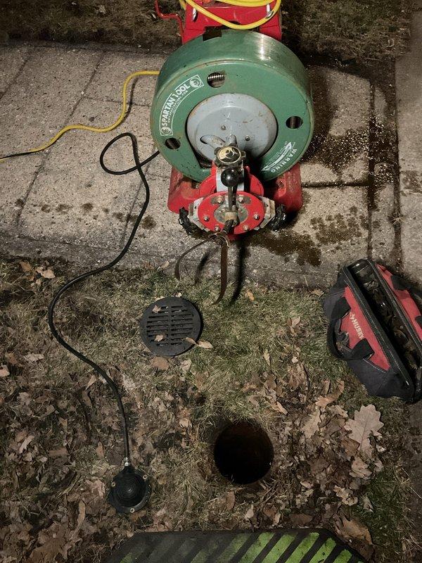 Performed warranty power rodding service using Speedrooter equipment to clear copper drain line showing significant interior corrosion and blockage. Successfully restored proper drainage through the affected pipe, which showed signs of oxidation and aging.