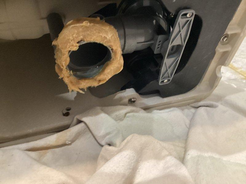 Responded to warranty call regarding persistent odor issues after previous toilet installation. Upon inspection, found improper wax ring seal at the toilet base causing sewer gas to escape. Removed toilet, cleaned old wax residue, installed new wax ring with proper seal, and securely reseated toilet. Confirmed proper operation and elimination of odor issue.