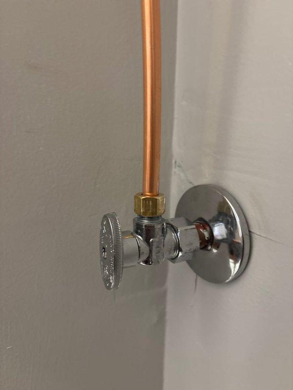 Responded to a service call for a leaking steam shower supply line. Inspected the chrome water shut-off valve and associated copper supply line. Located and repaired the leak at the compression fitting where the copper line connects to the valve assembly. Tested the system to confirm proper function with no further leakage.