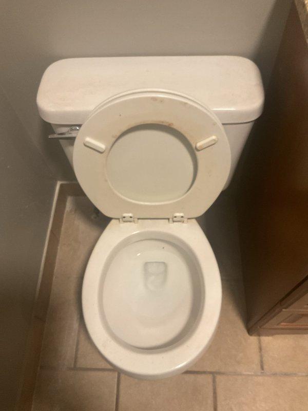 Conducted assessment for replacement of undermount bathroom sink. Existing granite countertop has functional mounting clamps in place. Customer requests contractor to supply new sink. Documented current plumbing configuration including drain assembly and supply lines.
