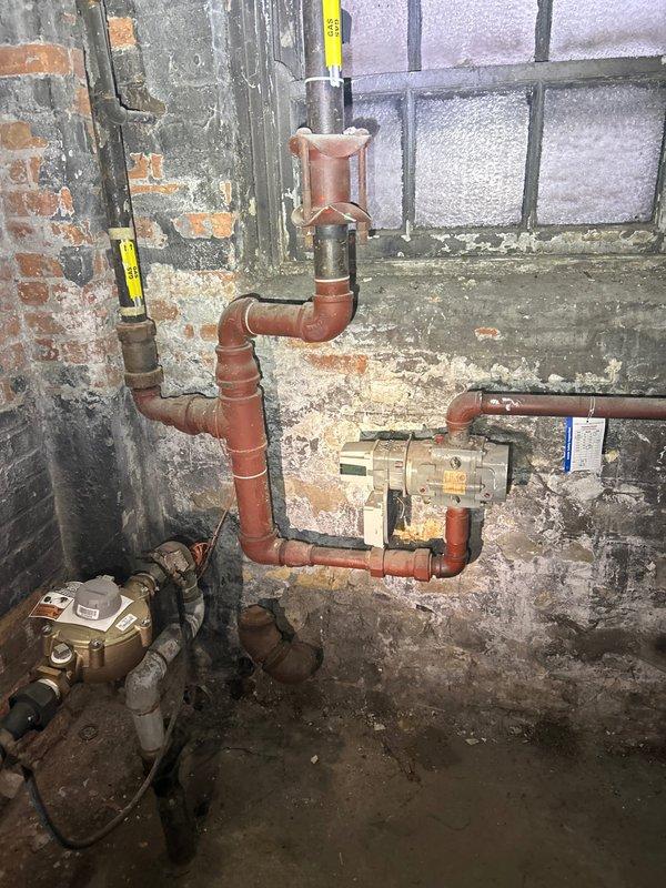 Responded to service call for clogged drain issue after 12:30pm. Upon inspection, discovered severely corroded copper piping in basement utility area with multiple deteriorating joints and visible water damage to surrounding walls. Determined gas line replacement was necessary due to extensive oxidation and potential leak hazards at connection points.