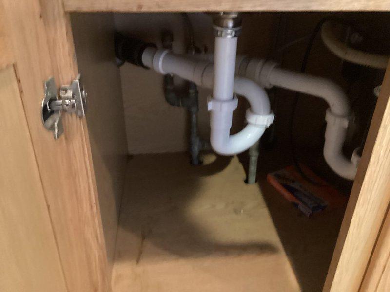 Completed installation of new garbage disposal unit as requested by customer and sold by Chip. Properly connected disposal to existing PVC drain system with appropriate P-trap configuration. Verified all connections were secure with no leaks observed after installation.