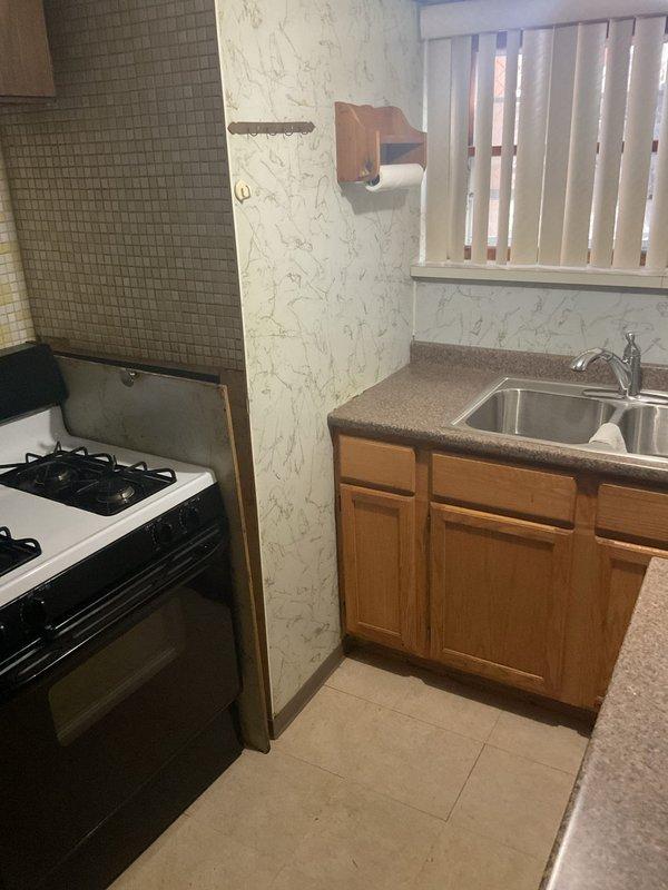 Conducted inspection of property to assess water heater needs and plumbing requirements. Client requires installation of additional water heater while maintaining existing unit. Evaluated basement sink that needs reconnection to source line and potential wet bar installation. Kitchen renovation will require professional plumbing services for fixture connections and proper installation according to code requirements.