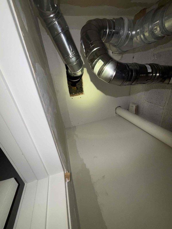 Completed installation of customer-supplied tankless water heater in mechanical room. Installed and connected necessary ventilation ductwork with proper metal elbow joints and fasteners. Ensured proper PVC pipe connections for water supply and drainage.