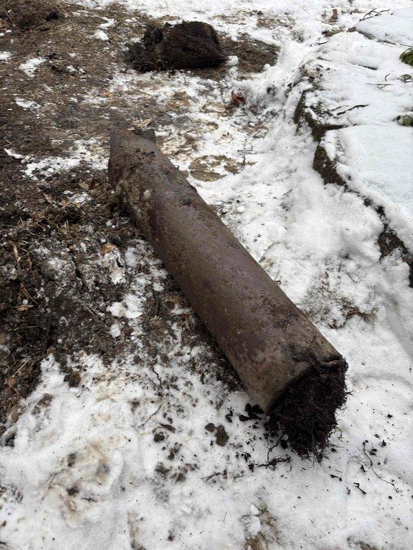 Responded to service call for floor drain backup occurring during washing machine use. Completed rodding of accessible drain lines. Located broken section of pipe in exterior flower bed requiring excavation as evidenced by exposed soil area. Scheduled underground crew to remove and replace damaged pipe section tomorrow.