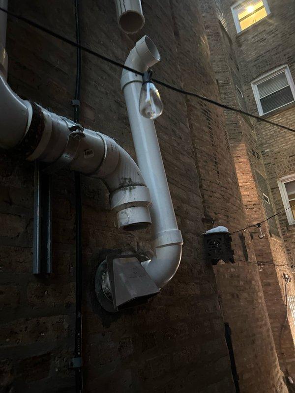 Inspected Bradford White water heater in utility area and examined exterior ventilation system. Job sold for future installation in spring 2026 as requested by customer. Documented current setup with photos for reference during scheduled installation.