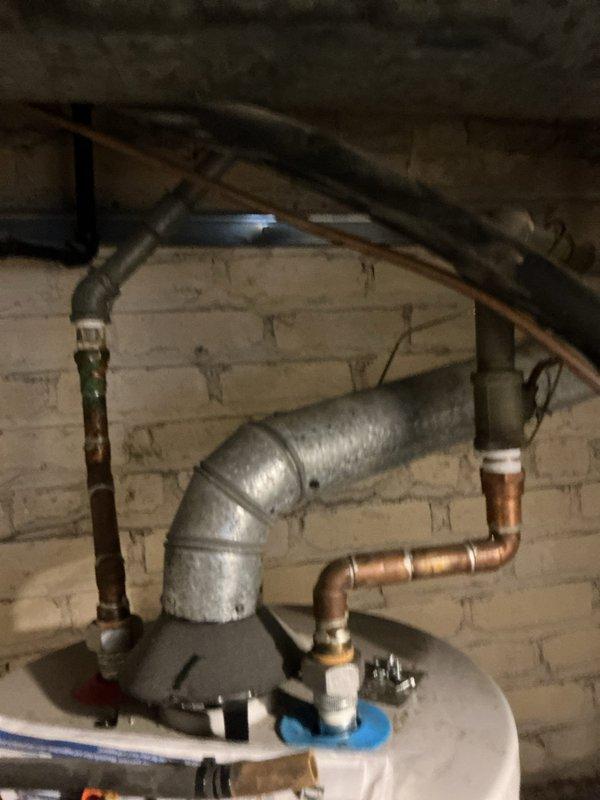 Responded to prioritized service call to address shower handle malfunction. Repaired handle mechanism that was spinning 360 degrees, restoring proper 90-degree operation to match functioning unit. Additionally, replaced rusted iron pipe connections in basement near water heater and installed customer-supplied reverse osmosis filtration system under kitchen sink, including cutting appropriate hole in countertop for new filtration system faucet.