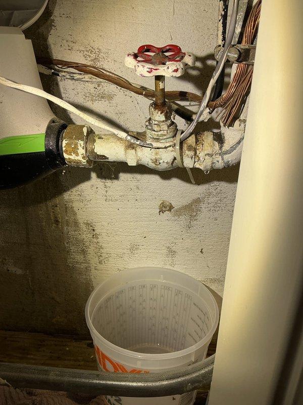 Responded to customer request to replace corroded shut-off valve near water meter connected to galvanized piping. Accessed plumbing through wall cavity, removed old valve showing significant corrosion and mineral buildup, and installed new shut-off valve. Provided customer with estimate for lead service line replacement as requested.