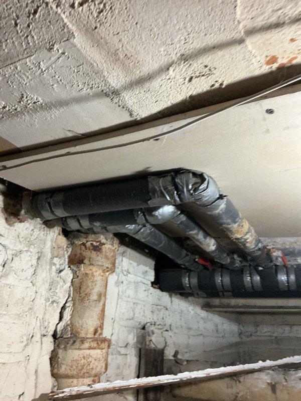 Responded to callback regarding lack of hot water following previous shower faucet repair. Inspection revealed extensive corrosion and mineral buildup on the tub faucet assembly with deteriorated central spout. Corroded components were affecting hot water flow. Replaced damaged cartridge and cleaned mineral deposits from valve body, restoring proper hot water function to the shower.