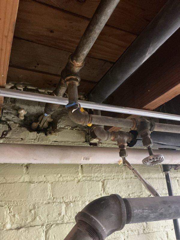 Conducted assessment for basement bathroom and laundry room rough-in project. Inspected existing plumbing infrastructure, noting aged cast iron/galvanized piping with visible corrosion at joints, along with more recent PVC and copper pipe installations. Documented current configuration of supply lines, drainage system, and shutoff valves to develop comprehensive quote for new fixture installations and necessary upgrades to existing plumbing system.
