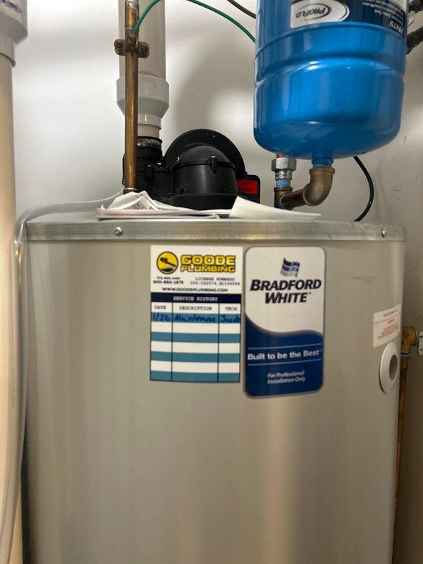 Performed VIP maintenance on Bradford White water heater, including inspection of tank, connections, and expansion tank. Checked humidifier as requested and verified proper operation of all components. System appears to be in good working condition with proper installation of all plumbing connections.