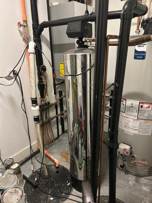 Responded to customer request for toilet installation estimate. Inspected existing plumbing connections, including PVC clean-out access point and water supply lines. Evaluated mechanical room configuration with water heater and associated piping to determine compatibility with customer's planned toilet installation.