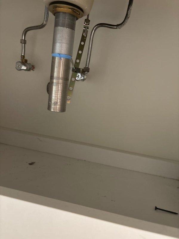 Successfully reconnected water supply lines to customer's sink, ensuring proper installation of all plumbing components including supply valve, drainage assembly, and mounting hardware. Visual inspection confirmed no leaks and full functionality of the system.